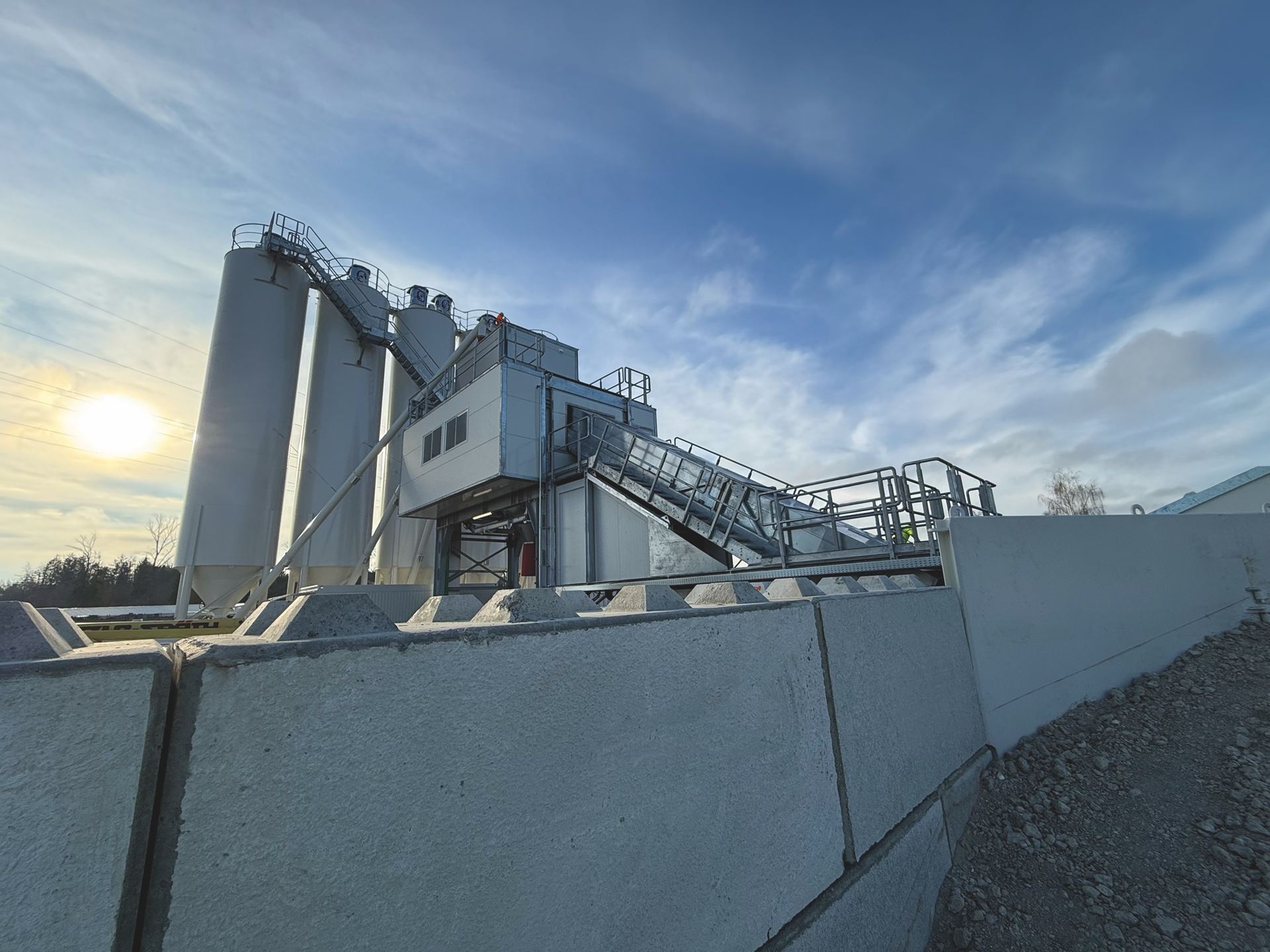 A NISBAU Prime plant on site at Weissenhorn, Germany, at dusk